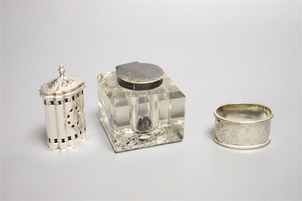 A collection of small silver items, comprising a George III helmet-shaped embossed cream jug,